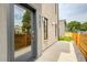 Modern front entrance with glass door and sleek design at 3205 Quivas St, Denver, CO 80211