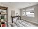 Bright home office space with a desk, shelving, and a window with natural light at 3205 Quivas St, Denver, CO 80211