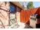 Enclosed patio with gas grill, offering an inviting outdoor space at 5833 S Pearl St, Centennial, CO 80121