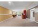 Finished basement with a pool table and wet bar and carpeting at 21690 Longs Peak Ln, Parker, CO 80138