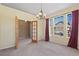 Inviting dining room featuring ample natural light, neutral carpet, and chandelier at 21690 Longs Peak Ln, Parker, CO 80138