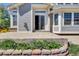 Paver patio with lush greenery, perfect for outdoor entertaining, and a beautiful outdoor setting at 20394 E Colgate Pl, Aurora, CO 80013