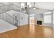 Spacious living room with fireplace, hardwood floors and high ceilings at 20394 E Colgate Pl, Aurora, CO 80013