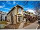 Townhome exterior, showing walkway and landscaping at 1885 S Quebec Way # 16, Denver, CO 80231