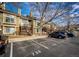 Exterior view of townhome with parking and landscaping at 1885 S Quebec Way # 16, Denver, CO 80231