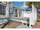 View of deck with white railing and glass doors leading into the house at 12638 James Pt, Broomfield, CO 80020