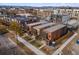 Aerial view of modern townhomes showcasing contemporary design, landscaping, and urban location at 3275 Lawrence St, Denver, CO 80205