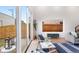 Living area showcasing large windows, modern furniture, and an open layout at 3275 Lawrence St, Denver, CO 80205