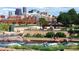 Scenic view of the riverfront featuring kayakers, bridges, and the city skyline in the background at 3275 Lawrence St, Denver, CO 80205