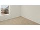 Spacious bedroom with carpet and a large window at 20972 E 66Th Ave, Aurora, CO 80019