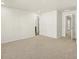 Spacious bedroom with carpet and access to other rooms at 20972 E 66Th Ave, Aurora, CO 80019