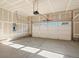 Spacious garage with automatic door opener and concrete floor at 20972 E 66Th Ave, Aurora, CO 80019