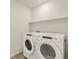 Laundry room with washer and dryer at 20972 E 66Th Ave, Aurora, CO 80019