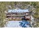 Spacious home with skylights, multiple decks, and surrounded by a beautiful forest setting at 21191 Pleasant Park Rd, Conifer, CO 80433