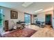 Bonus room with hardwood floors, skylights, access to a deck and a work space at 21191 Pleasant Park Rd, Conifer, CO 80433