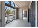 Balcony with railings, views of the parking lot, and access to the condo unit at 9222 E Arbor Cir # L, Englewood, CO 80111