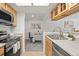 View of a dining area from the kitchen at 9222 E Arbor Cir # L, Englewood, CO 80111