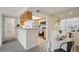 Bright, open kitchen with stainless steel appliances at 9222 E Arbor Cir # L, Englewood, CO 80111