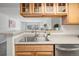 Modern kitchen with stainless steel appliances and an open design at 9222 E Arbor Cir # L, Englewood, CO 80111