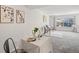 Bright open living space with dining area and large windows at 9222 E Arbor Cir # L, Englewood, CO 80111
