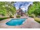 Outdoor pool and clubhouse, perfect for summertime gatherings and relaxation at 9222 E Arbor Cir # L, Englewood, CO 80111