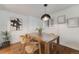Cozy dining room with wood table, pendant lighting, and stylish decor at 2090 Irving St, Denver, CO 80211