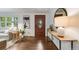 Inviting entryway showcasing hardwood floors, stylish decor, and a decorative front door at 2090 Irving St, Denver, CO 80211