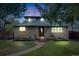 Inviting two-story brick home with manicured lawn and mature trees at 2090 Irving St, Denver, CO 80211
