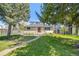 Attractive home with well-kept lawn, landscaped garden beds, and inviting entry enhance curb appeal at 2090 Irving St, Denver, CO 80211
