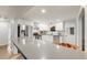 Modern kitchen featuring white cabinets, stainless steel appliances, and a stylish breakfast bar at 2090 Irving St, Denver, CO 80211