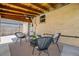 Rear patio with comfortable seating area and ceiling fan at 2090 Irving St, Denver, CO 80211