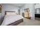 Comfortable bedroom with stylish furnishings, a dresser, and a peaceful ambiance for relaxation at 10795 Sundial Rim Rd, Highlands Ranch, CO 80126