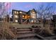 Stunning home featuring beautiful stone accents and large windows that provide plenty of natural light at 10795 Sundial Rim Rd, Highlands Ranch, CO 80126