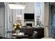 Elegant dining space offers great room views, chandelier lighting and easy access to the patio at 10795 Sundial Rim Rd, Highlands Ranch, CO 80126