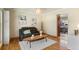 Cozy living room with hardwood floors, stylish decor, and abundant natural light at 1430 S Lima St, Aurora, CO 80012