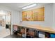 Functional workshop area featuring pegboard, storage and a workbench, ideal for hobbies and projects at 1430 S Lima St, Aurora, CO 80012