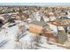 Aerial view of house and street in winter at 2492 S Jebel Way, Aurora, CO 80013