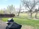 Landscaped backyard area with grill, offering outdoor enjoyment and space for relaxation at 5690 W 79Th Ave, Arvada, CO 80003