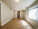 This bedroom boasts new wood floors and a sunny window, perfect for relaxation at 5690 W 79Th Ave, Arvada, CO 80003