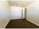 Empty carpeted bedroom with neutral walls and a doorway at 5690 W 79Th Ave, Arvada, CO 80003
