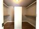 Spacious walk-in closet with built-in shelving and ample storage space, offering organization at 5690 W 79Th Ave, Arvada, CO 80003
