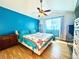 Bedroom with a ceiling fan, and a window allowing natural light at 5690 W 79Th Ave, Arvada, CO 80003