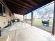 Outdoor patio, ideal for entertainment, with a view of the large backyard at 5690 W 79Th Ave, Arvada, CO 80003