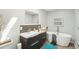 Bathroom showcasing a modern freestanding tub, and a floating vanity at 2408 Irving St, Denver, CO 80211