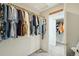 Walk-in closet featuring built-in shelving, and two rows of hanging storage space at 2408 Irving St, Denver, CO 80211