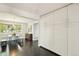 Bright dining area with hardwood floors, large window, and lots of storage at 2408 Irving St, Denver, CO 80211