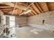 An empty garage with lighting offers a versatile space for parking, storage, or DIY projects at 2408 Irving St, Denver, CO 80211