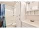 Bathroom featuring a shower with a blue shower curtain, toilet, and vanity at 25561 E 5Th Pl, Aurora, CO 80018