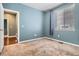 Bedroom with neutral walls and light-colored carpet at 25561 E 5Th Pl, Aurora, CO 80018