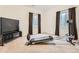 Carpeted exercise room with TV at 25561 E 5Th Pl, Aurora, CO 80018